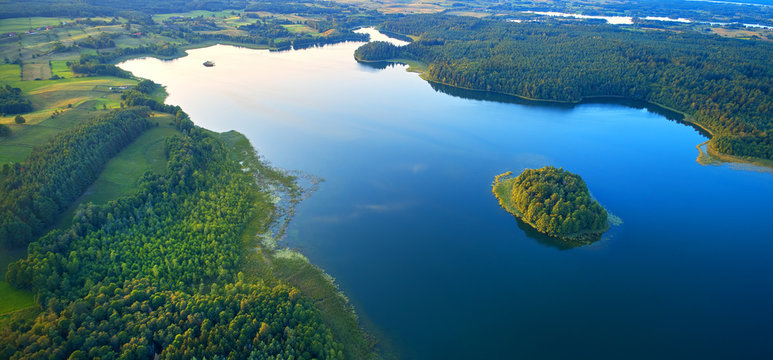 Aerial landscape from the drone - lake in masuria lake district © Piotr Krzeslak