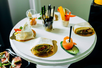 Appetizers  presented on a yellow-black background