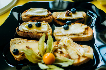 Appetizers  presented on a yellow-black background