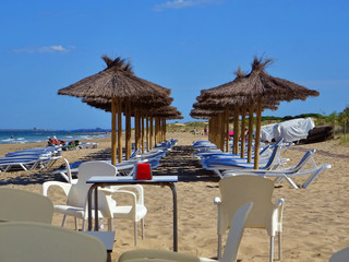 bar terrace with awning on the sand of the beach in Alicante Spain