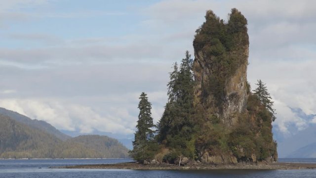 Misty Fiords Alaska Nature Landscape Landmark the New Eddystone Rock. Seen from tourist Cruise ship on adventure travel tour in Alaska in Misty Fjords National Monument, Wilderness area in the Tongass
