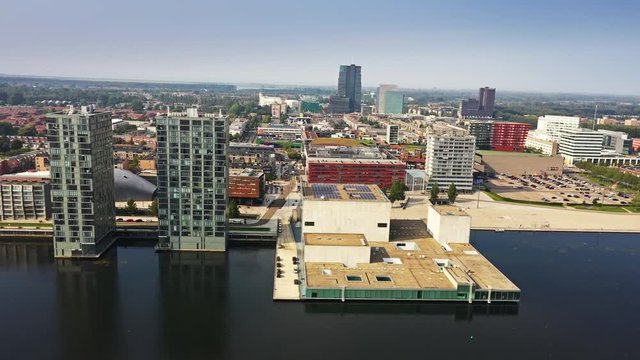 Aerial view of Almere City, the Netherlands,  with its business buildings, shops and lesure lake.