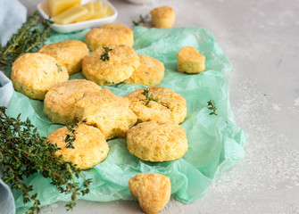 Freshly baked delicious english scones or cookies with cheese and thyme. Savory cheese scones or cookies.