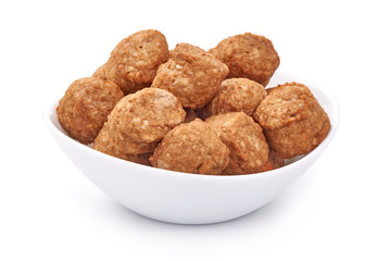 Chicken meatballs in a bowl, isolated on white background