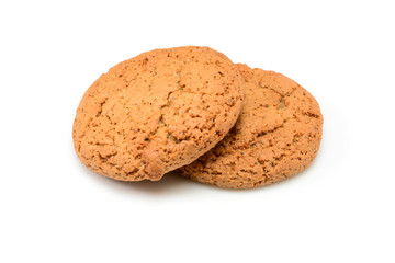 Homemade cookies. Two sweet cookie made from oatmeal flour. Tasty biscuit in high resolution closeup isolated on white background. Homemade bakery.