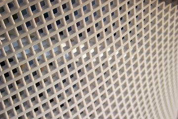 closeup of a geometric texture of a plastic chair