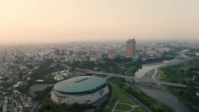 4k aerial drone footage - City of Maebashi at sunrise. Gunma Prefecture, Japan