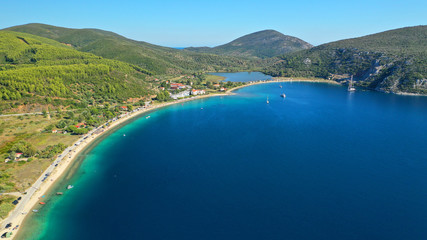 Obraz premium Aerial drone photo of iconic paradise bay and sandy beach of Porto Koufo with turquoise calm sea protected by winds, South Sithonia Peninsula, North Greece