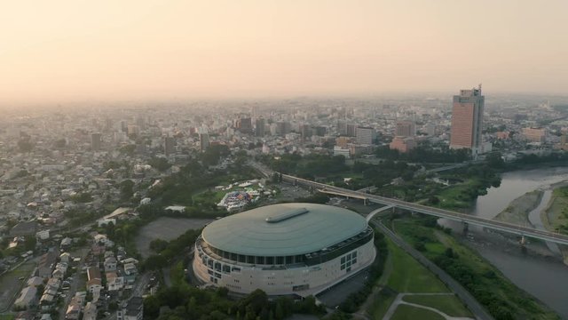 4k aerial drone footage - City of Maebashi at sunrise. Gunma Prefecture, Japan