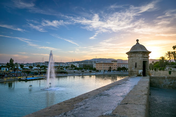 Sunset view of the Palma de Mallorca port and its old town © Sergey Kelin