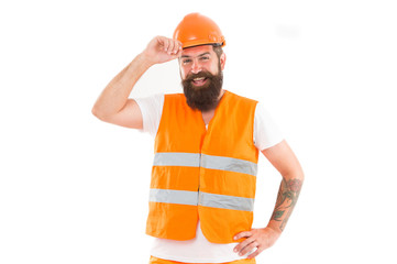 Strong handsome builder. Creating solid foundation. Man protective hard hat and uniform white...