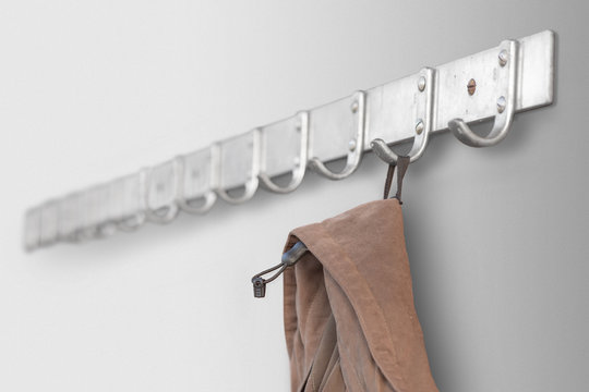 Vintage wooden coat hanger stand isolated on white background.. Vintage wooden coat hanger stand isolated on white background..