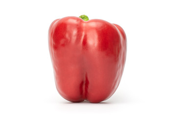 One whole red bell pepper isolated on white background