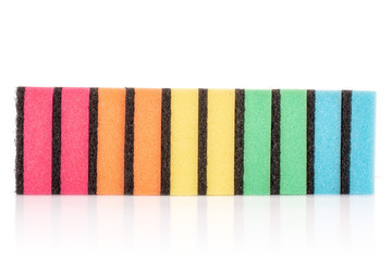 Group of ten whole cleaning kitchen sponge rainbow colours isolated on white background