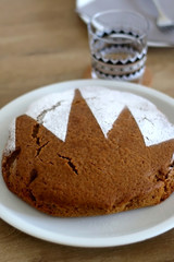 Homemade sponge cake served on a table. Selective focus.
