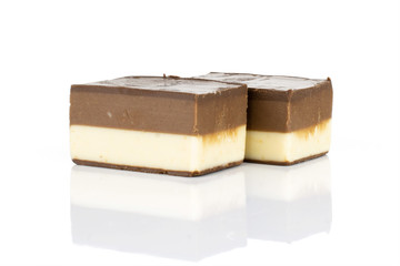 Group of two whole mellow two coloured nougat piece isolated on white background