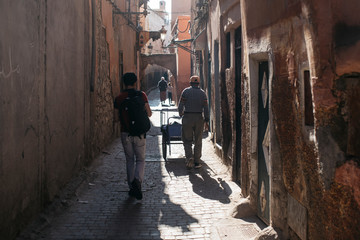 men walking in the medieval street