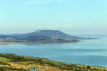 Fototapeta premium Lake Balaton with the Badacsony mountain in the background.