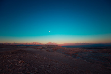sunset in mountains of atacama desert