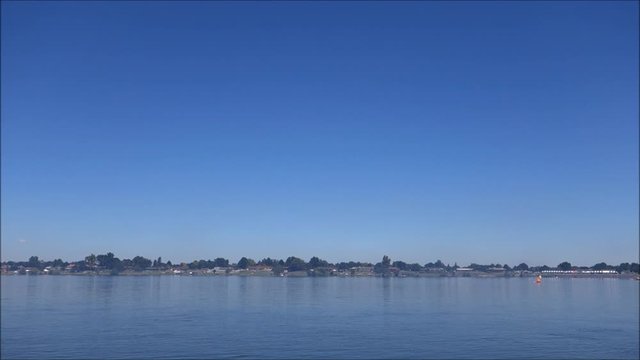 Plane flying over river 