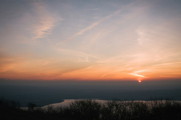 Fototapeta na wymiar Sunrise on the top of Palava hills, frosty until the sun is up