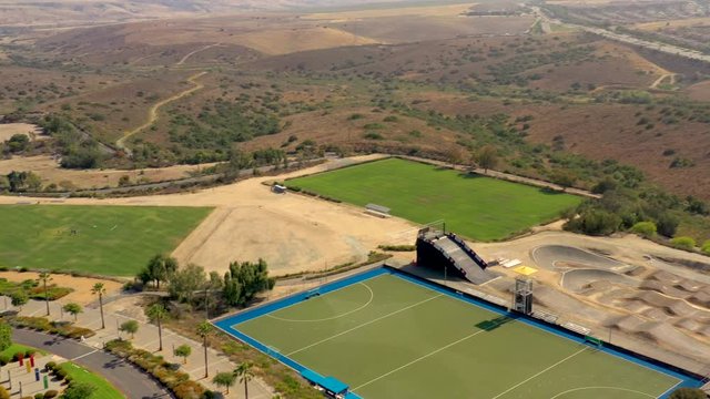 Panoramic view over Olympic Training Center,Chula Vista, CA. Drone fly over elite athlete training center and reveal panorama of american city countryside.