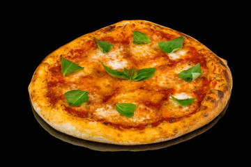 Italian pizza Margherita on black glass with reflection