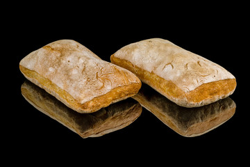 ciabatta on black glass with reflection