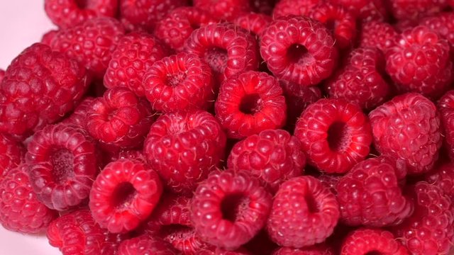 Close Up Rotation Loopable Raspberry. Fresh, Juicy Raspberry Background, Ripe. Macro Red Raspberries Fruit. Fresh Raspberry Fruits As Food Dackground. Healthy Food Organic Nutrition.