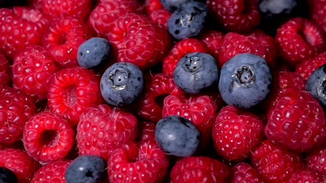 Close Up Rotation Loopable Raspberry. Fresh, Juicy Raspberry Background, Ripe. Macro Red Raspberries Fruit. Fresh Raspberry Fruits As Food Dackground. Healthy Food Organic Nutrition.