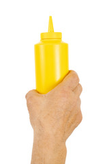 hand holding plastic ketchup box