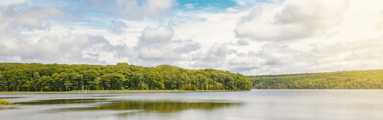 Beautiful landscape summer scene day view at Canadian Ontario Kettles lake in Midland area. Canada forest park nature and water reservoir. Web banner heaer for website.