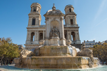 Fototapeta na wymiar Fountain in front of the church of Saint-Sulpice. Paris. France