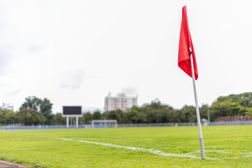 red corner flag of soccer field © dextorth