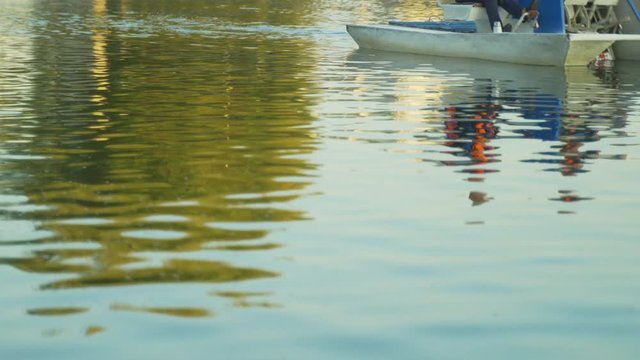 Blue catamarans on the waterfront. Catamaran rental. River and city water transport. Boat for travel vacation.