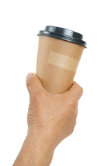 .man holding cardboard glass