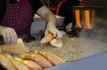 chef preparing  kokorech bread on the street in restaurant