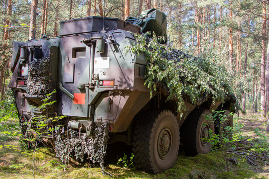 Armoured personnel carrier from german army stands in a military training area