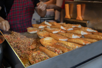 chef preparing  kokorech bread on the street in restaurant