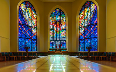 multicolored window stained-glass windows inside a beautiful historic church building