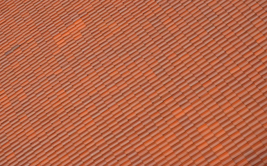 close up on red shingle on the roof