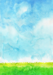 Green grass filed with blue sky watercolor hand painting background.