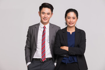 Asian business people standing..
