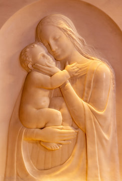 COMO, ITALY - MAY 9, 2015: The marble relief of Madonna in church Chiesa di San Andrea Apostolo (Brunate) by Dante Ruffini (1905 - 1963).