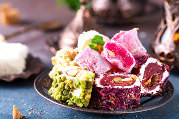 Traditional turkish sweets close up on a concrete background