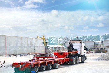 Truck with blue sky in large construction site,  Space for text in template, Industrial skyline (Mobile cranes)