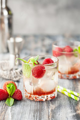 Cold lychee and raspberry cocktail.