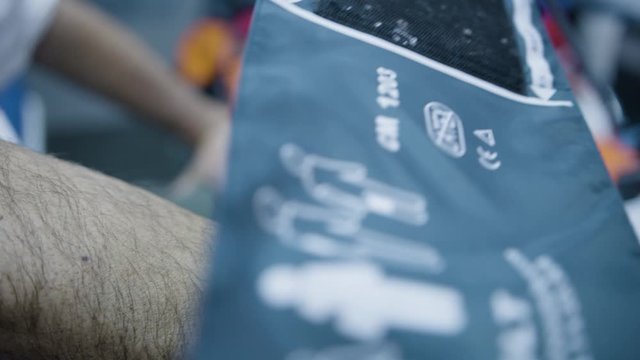 slomotion of a nurse measuring bood pressure, detail of an arm