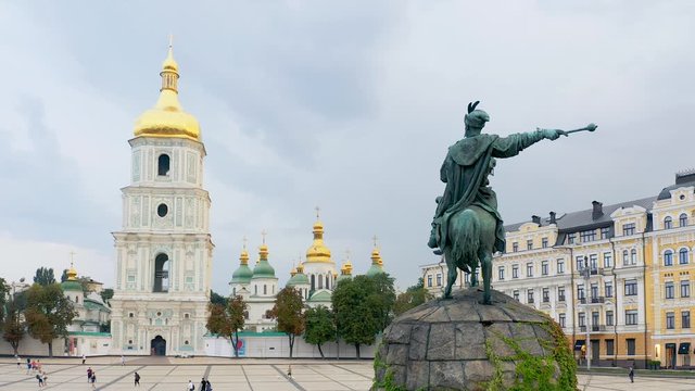 Saint Sophia's Cathedral and Hetman Bohdan Khmelnytsky Monument on square in Kiev (Kyiv). Aerial panoramic shot 4k