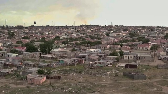 Informal shacks and lowcost housing in typical township of South Africa.